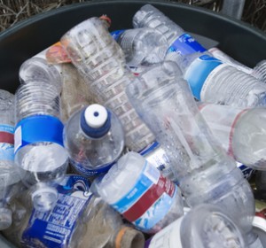 High angle view of plastic bottles in bin